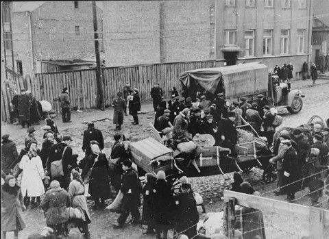 Jews in the Kovno ghetto are boarded onto trucks during a deportation action to Estonia